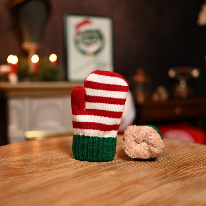 Moufle cozy de petit elfe de noël