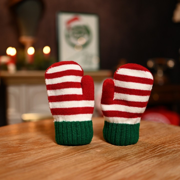 Moufle cozy de petit elfe de noël