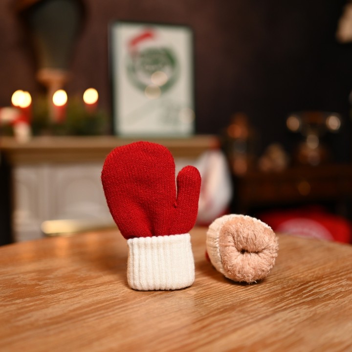 Moufle cozy de petit elfe de noël