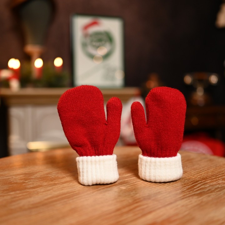 Moufle cozy de petit elfe de noël