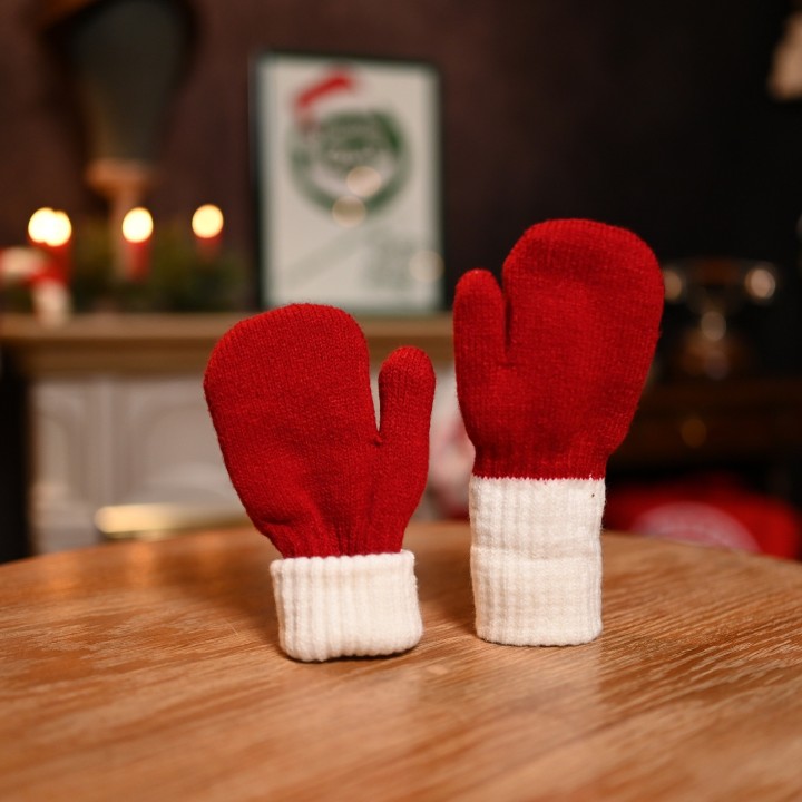 Moufle cozy de petit elfe de noël